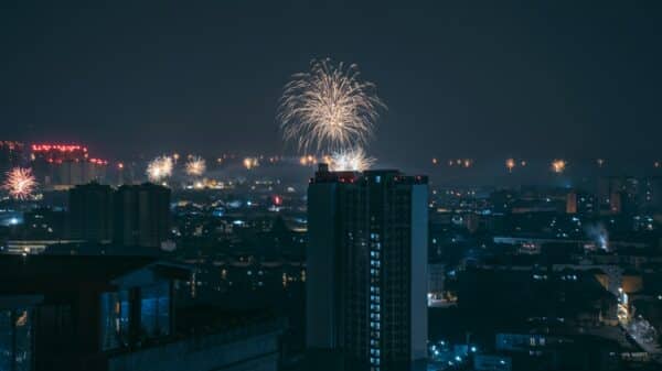 fireworks display above buildings