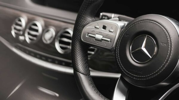 a steering wheel and dashboard of a car