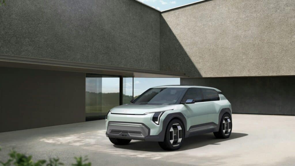 a small car parked in front of a building