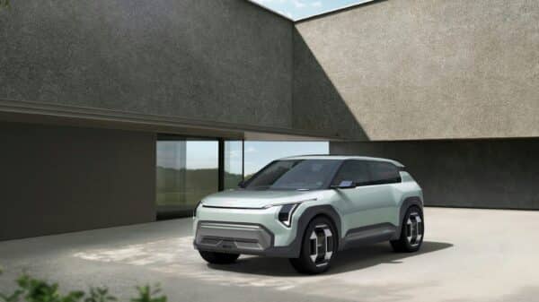 a small car parked in front of a building