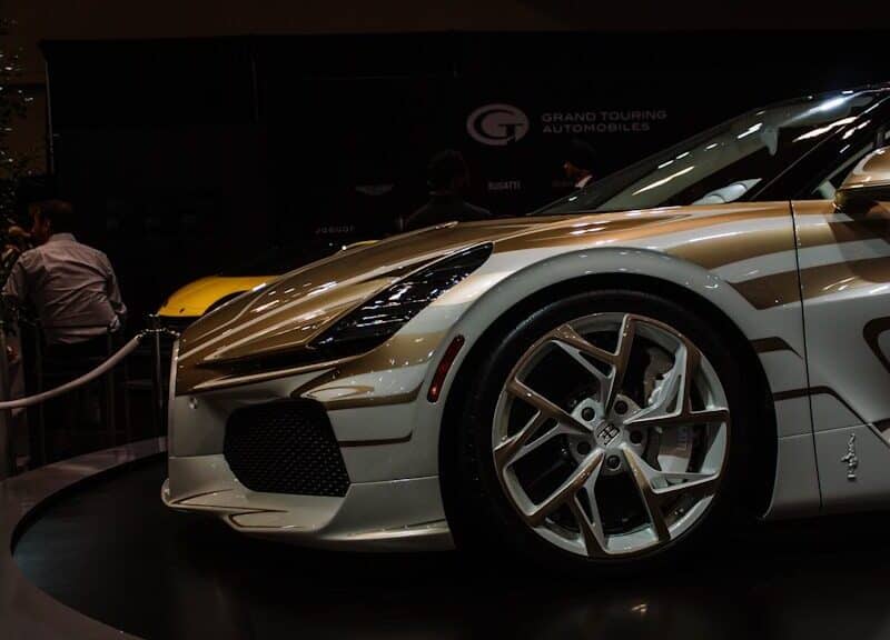 A custom sports car with unique gold accents on display