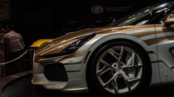 A custom sports car with unique gold accents on display