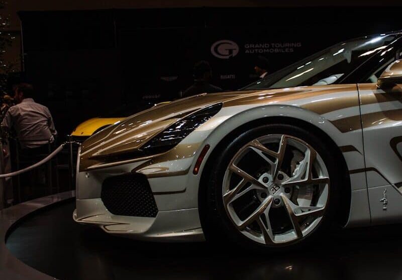 A custom sports car with unique gold accents on display