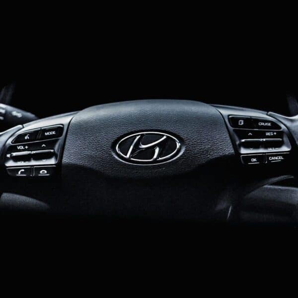 a black and white photo of a car dashboard