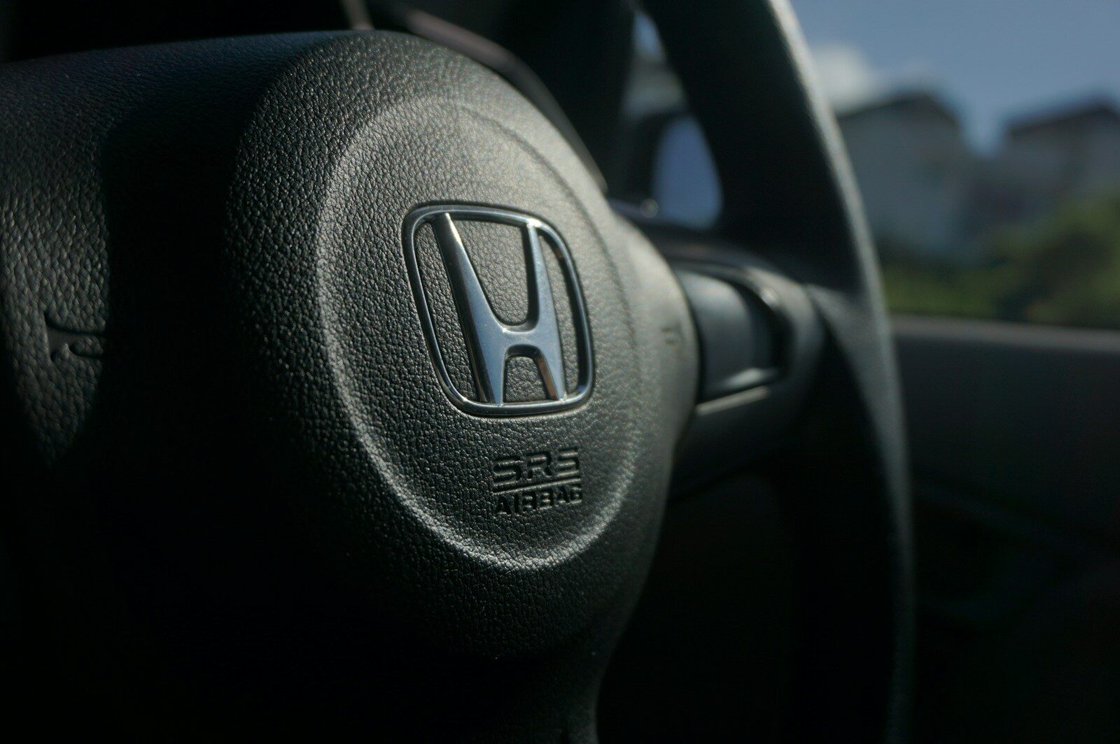 Close up of a car's steering wheel