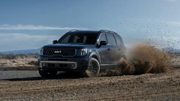 a car driving on a dirt road