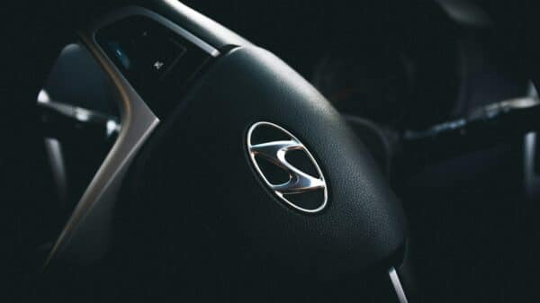 selective focus of black Hyundai steering wheel