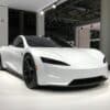 white lamborghini aventador parked in building