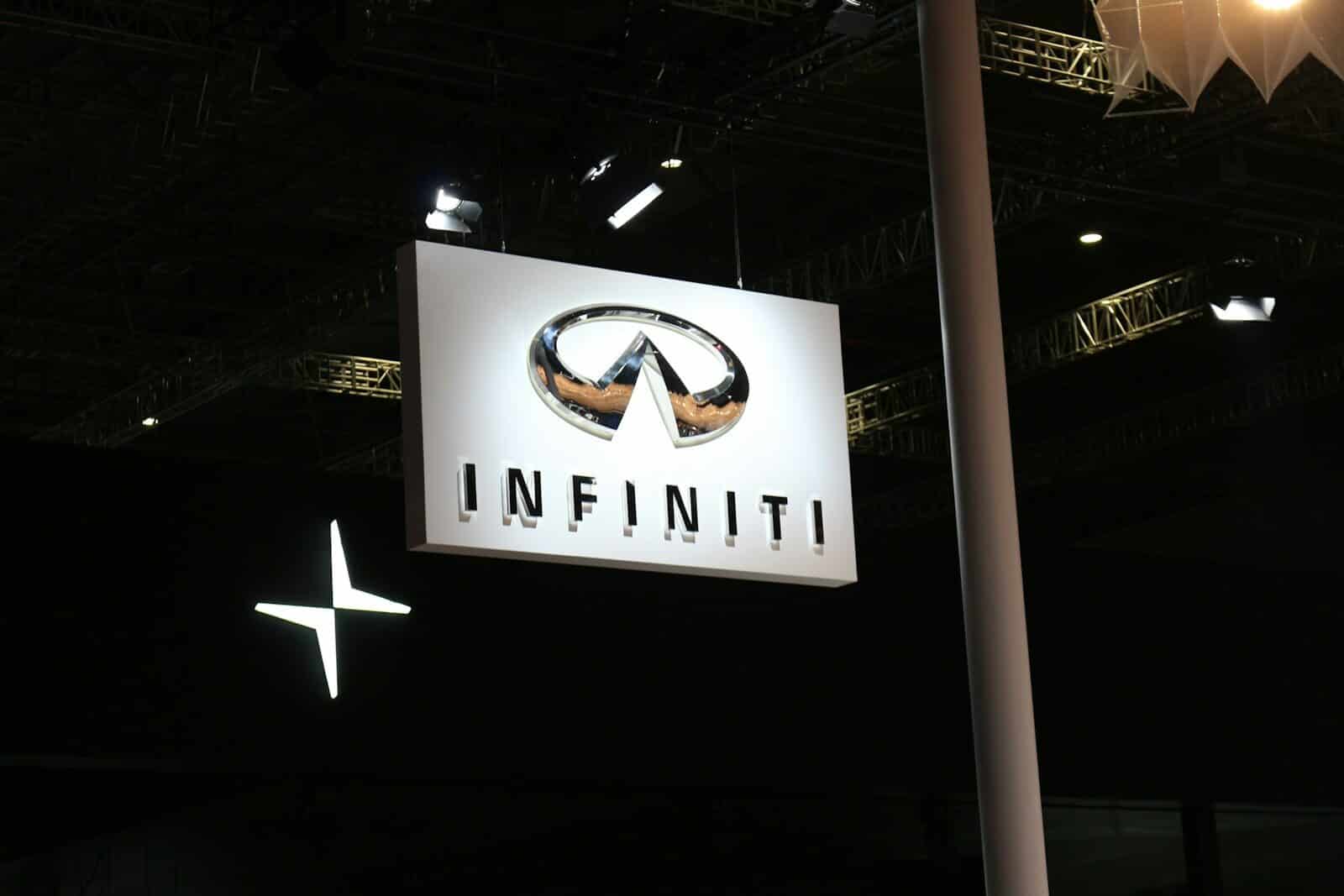 a sign hanging from the ceiling of a building